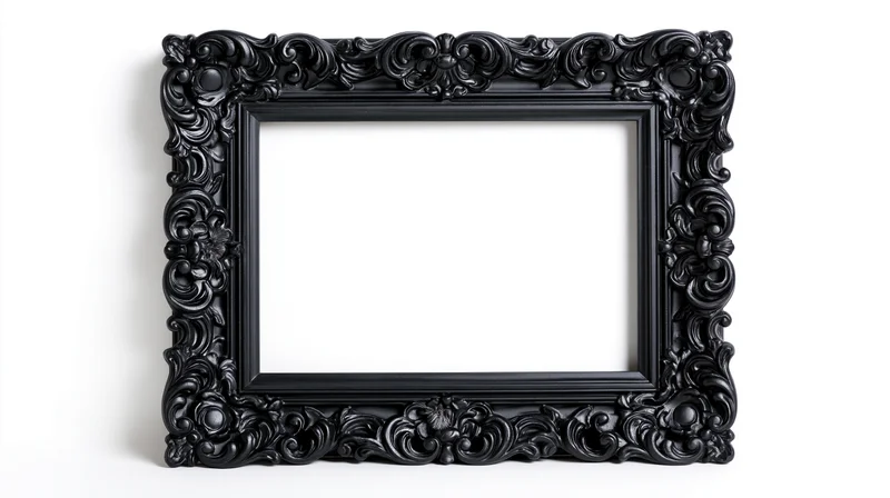 Ornate black baroque picture frame with elaborate carved scrollwork isolated on white background