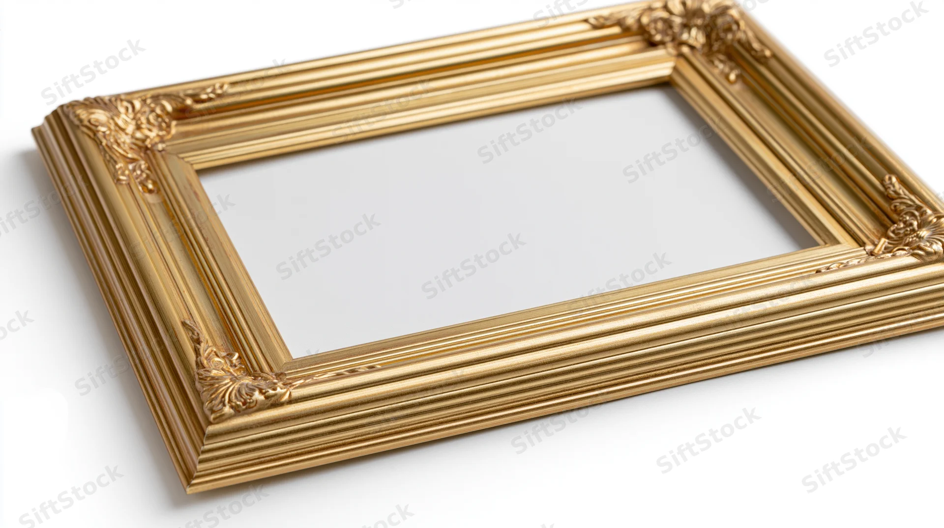 Ornate gold picture frame with floral corner embellishments on white background