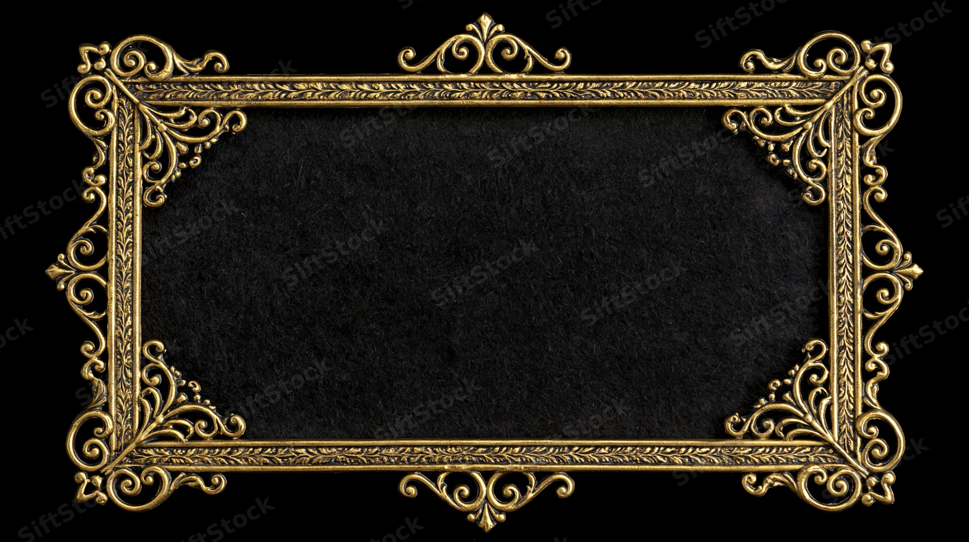 Ornate gold filigree frame with black textured background and copyspace