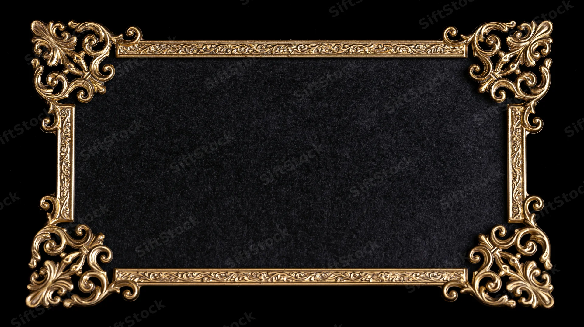 Ornate gold filigree frame with black textured center on black background