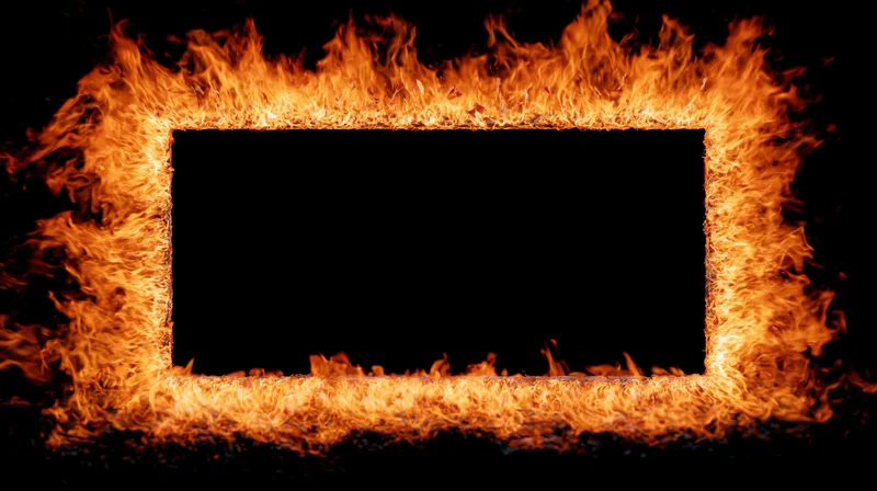 Rectangular frame of intense fire flames forming a border around a black center