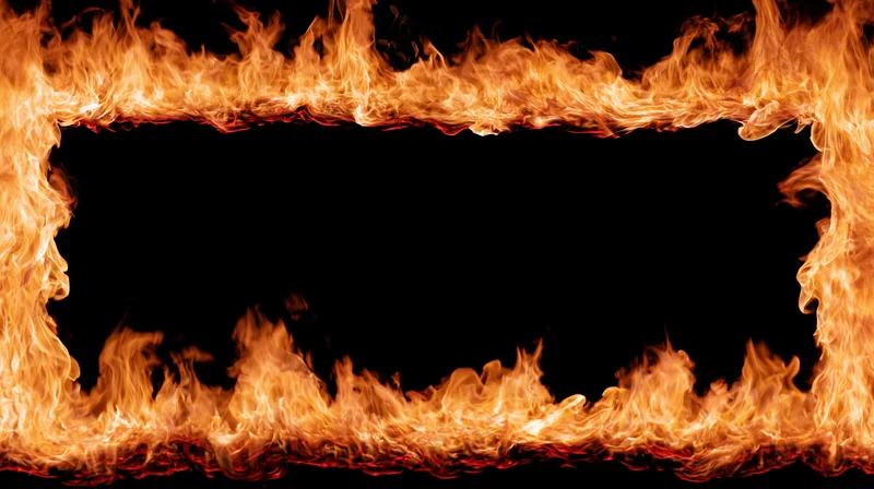 Rectangular frame of intense fire flames forming a border around a black center