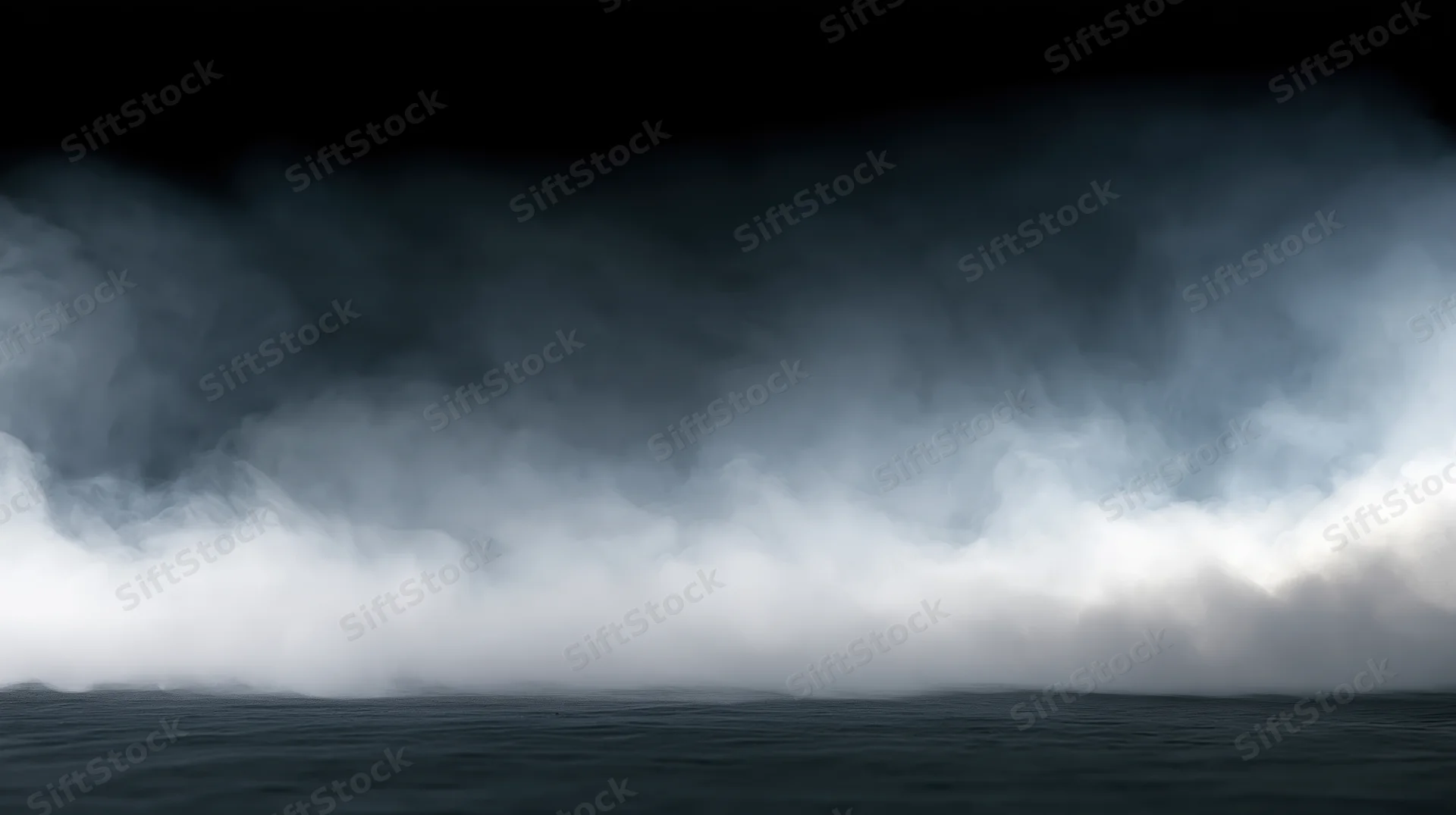 Thick white smoke and fog rolling low across a dark studio floor