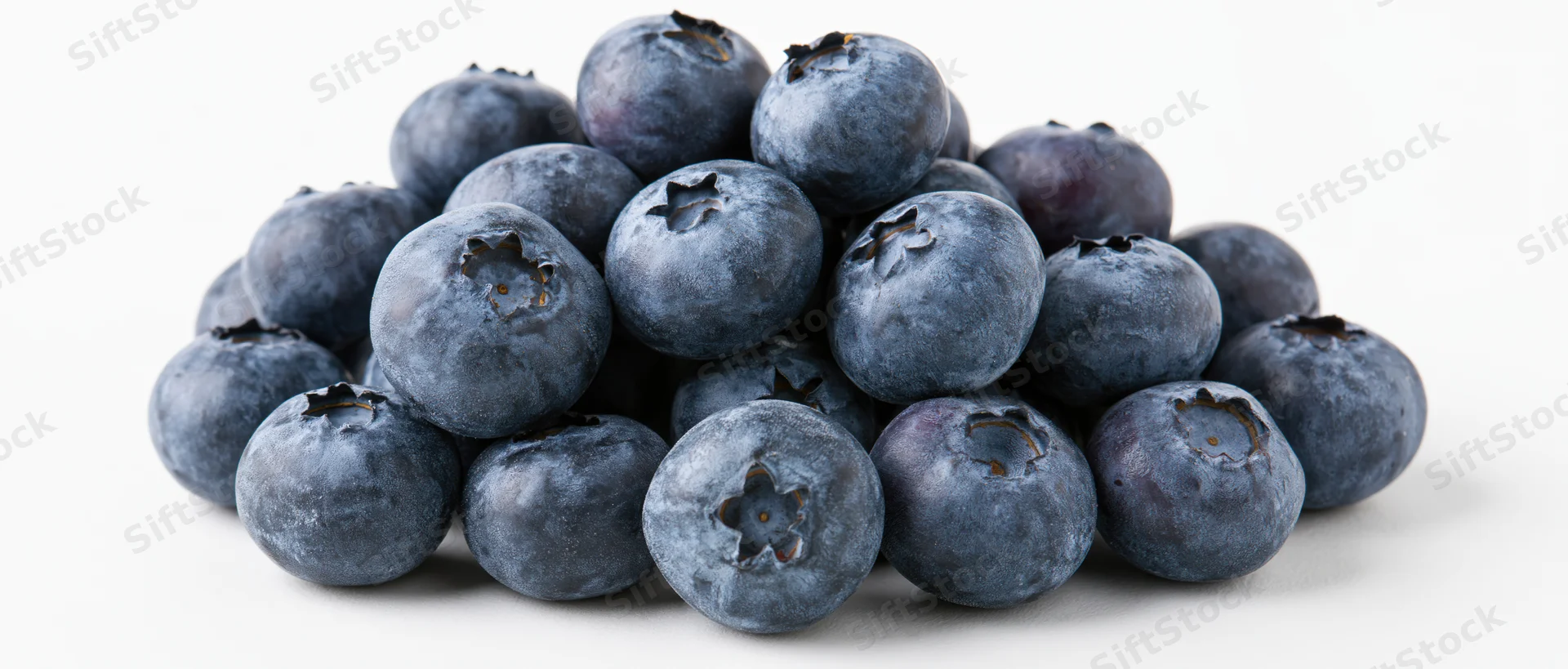 Pile of fresh blueberries on white background