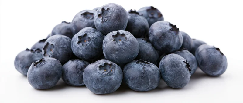Pile of fresh blueberries on white background