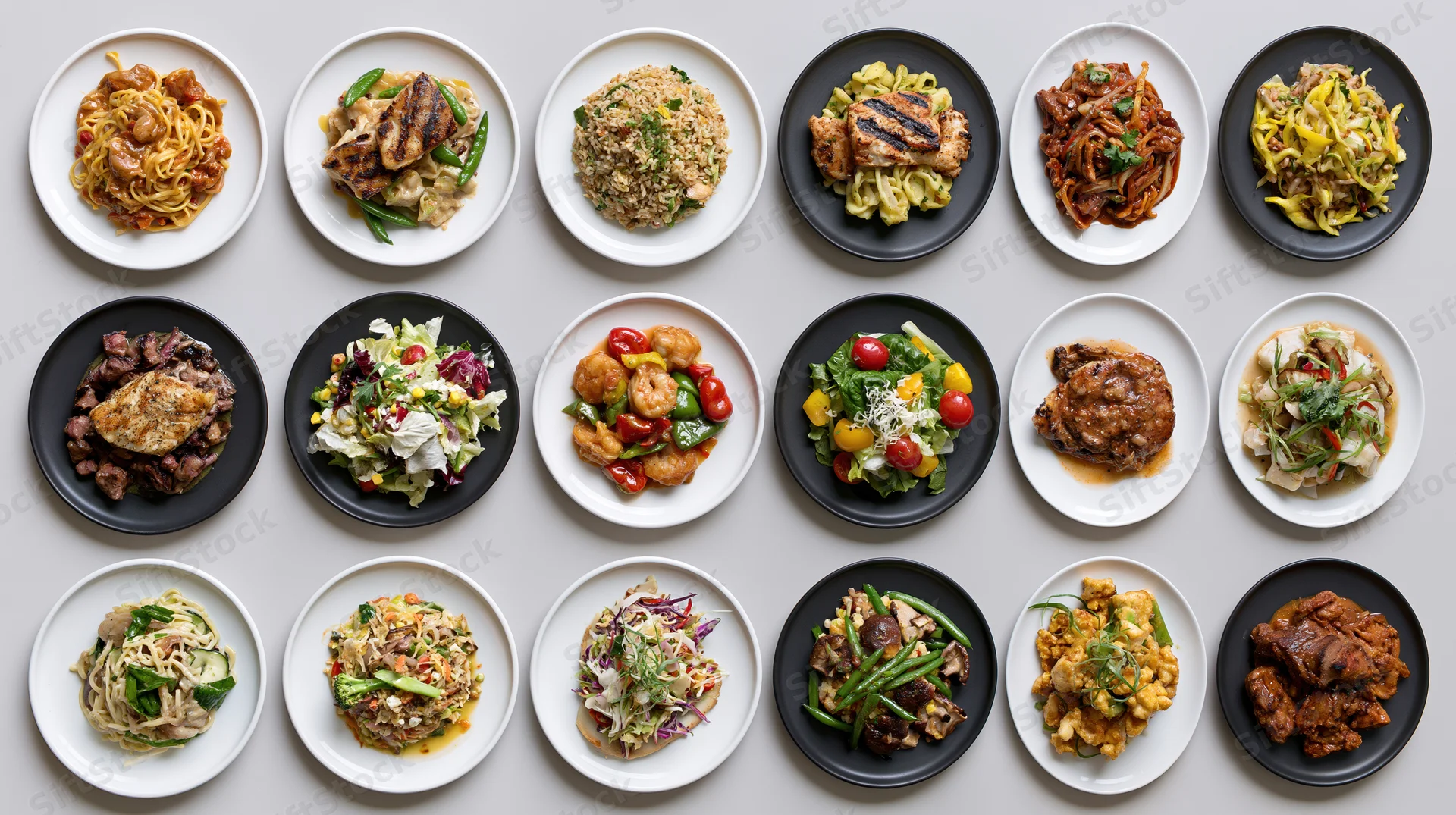 Twelve restaurant dishes arranged in a three-by-four grid on white and black plates, overhead view