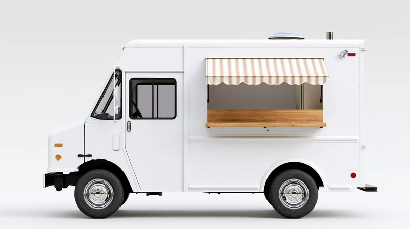 White food truck with striped awning and wooden counter viewed from side, parked on plain background