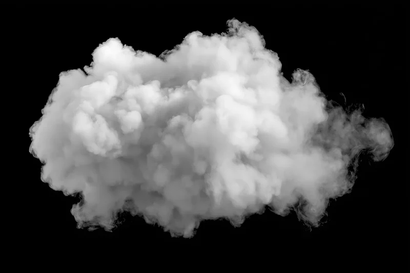Dense white smoke cloud billowing against black background