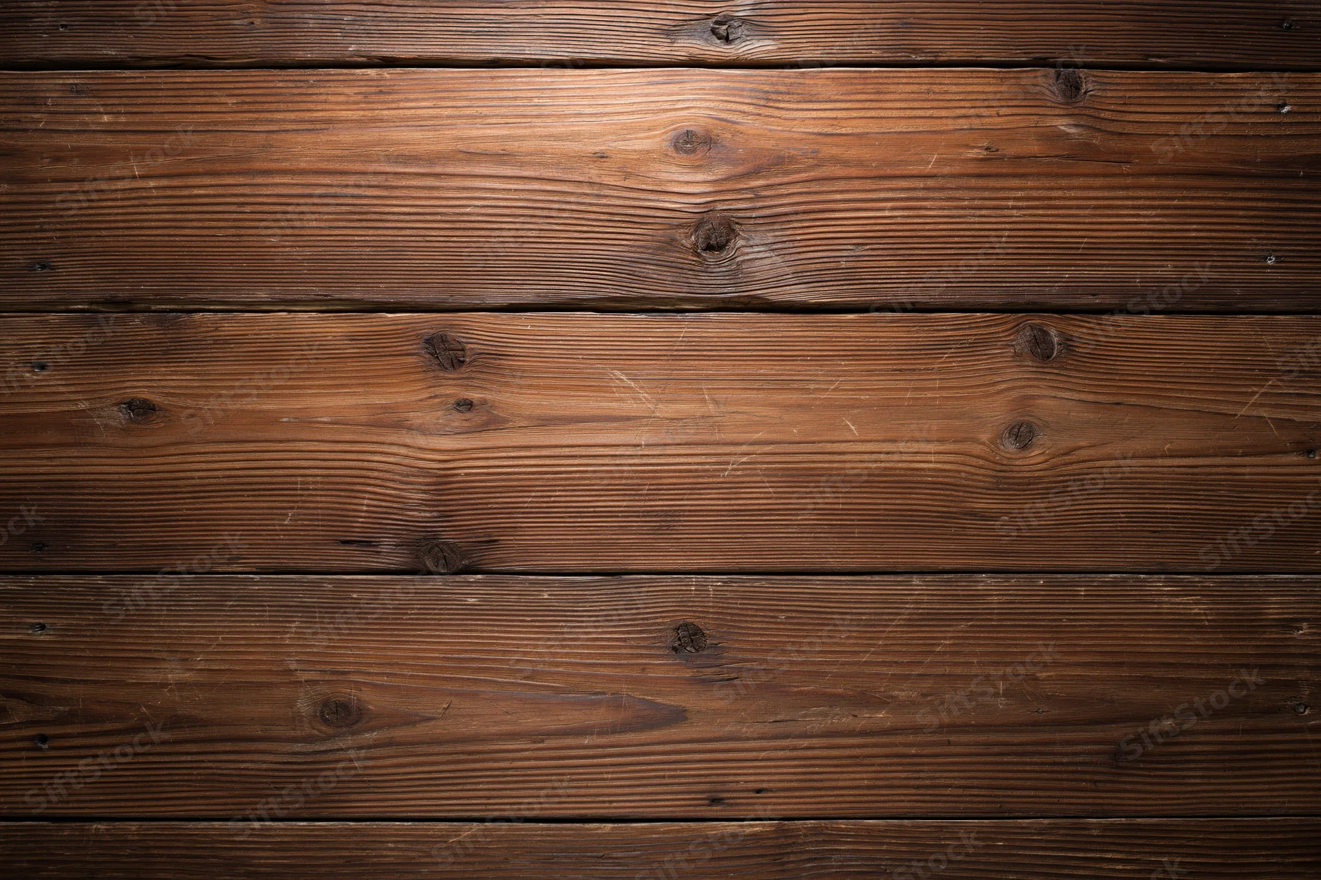 Horizontal aged wood planks filling the frame as a textured surface