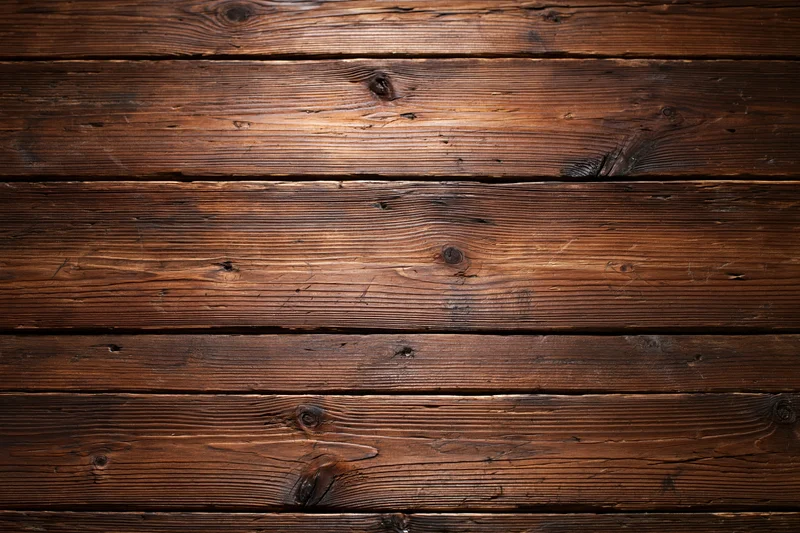 Horizontal aged wood planks filling the frame as a textured surface