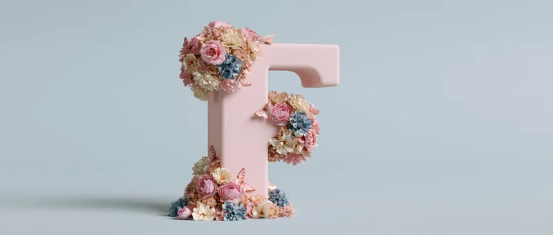 Pastel pink three-dimensional letter f decorated with floral arrangements standing upright on a light background