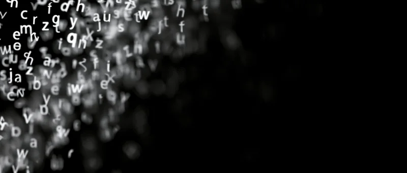 Lowercase letters floating and drifting upward against a black background
