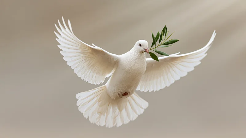 White dove in mid-flight carrying an olive branch against a soft beige background