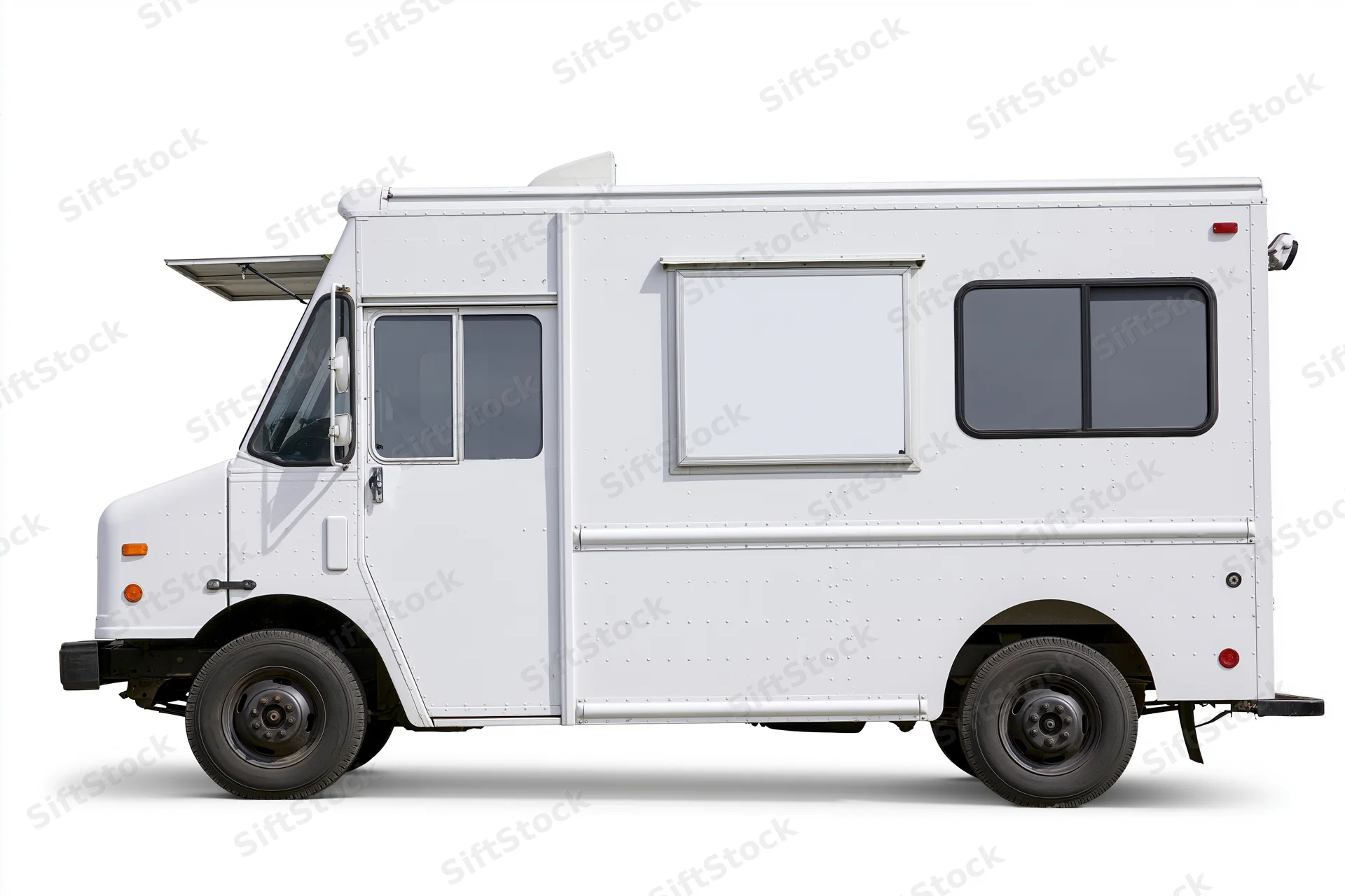 White food truck parked and viewed from the side with blank menu panel