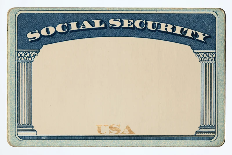 Blank united states social security card lying flat on white background
