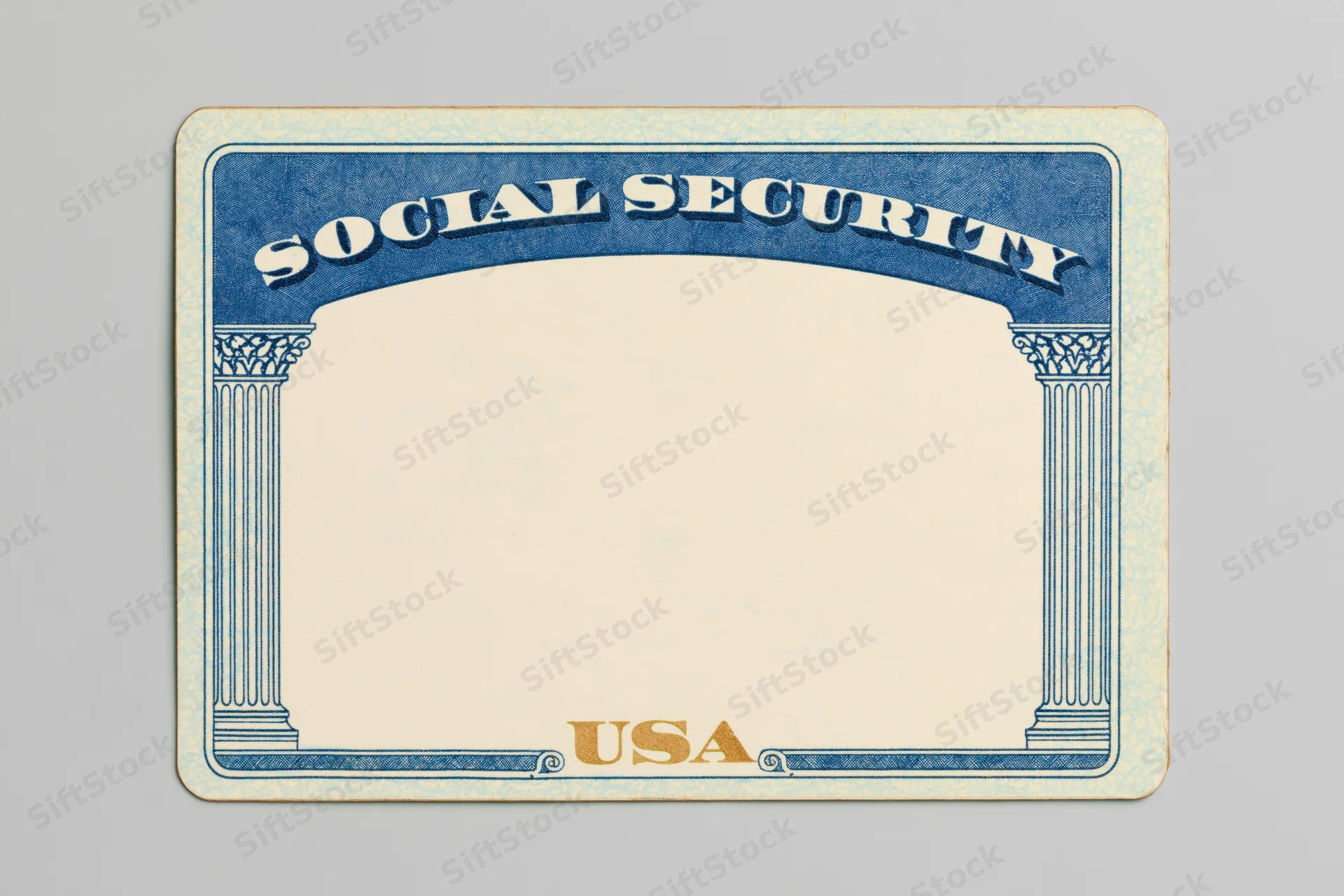 Blank united states social security card lying flat on a neutral surface