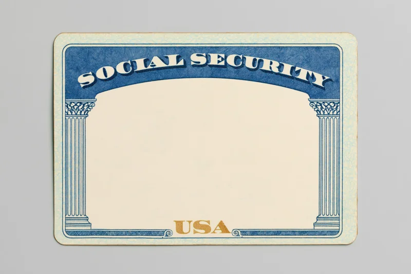 Blank united states social security card lying flat on a neutral surface
