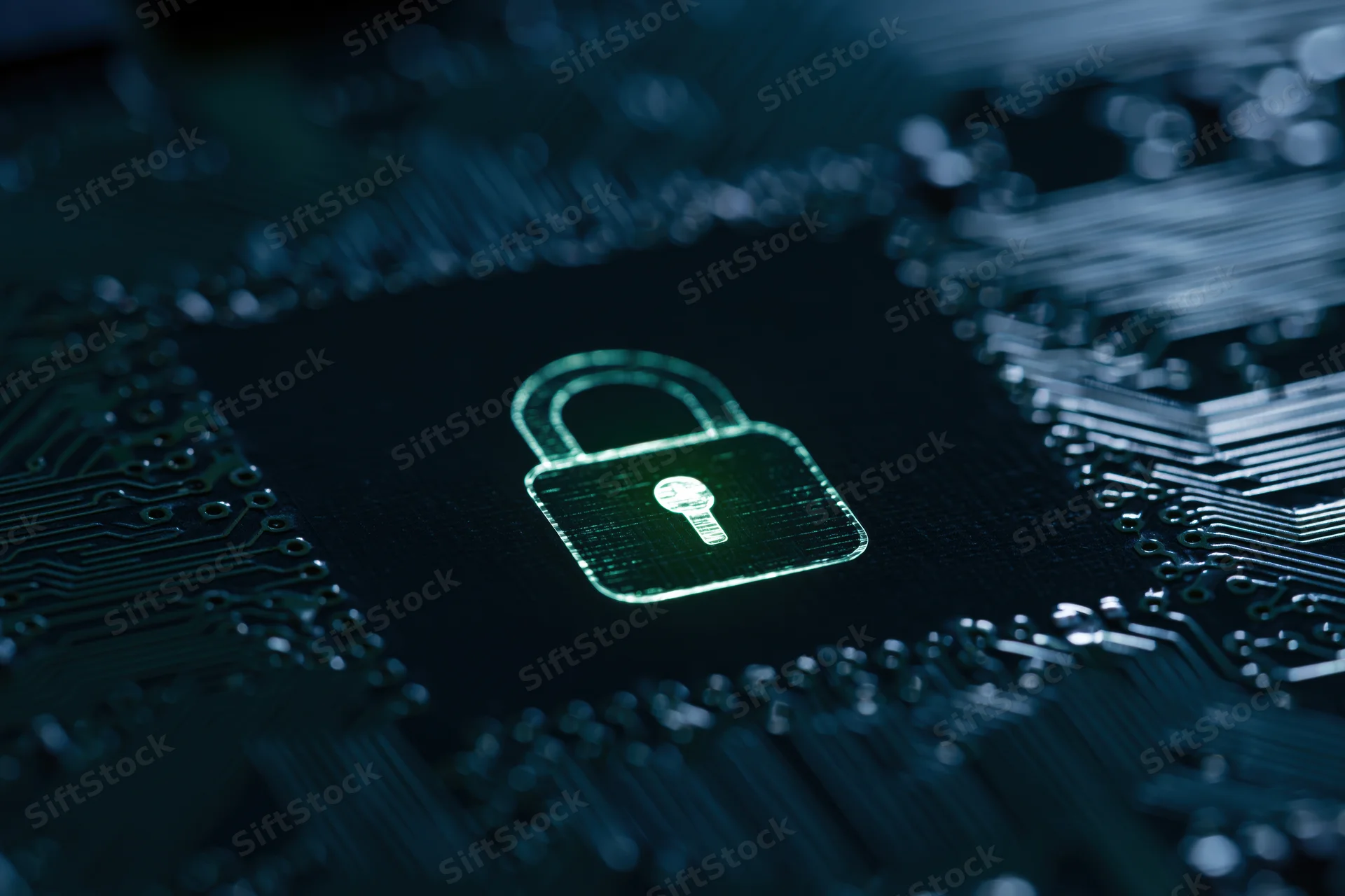 Glowing padlock symbol on dark circuit board surface