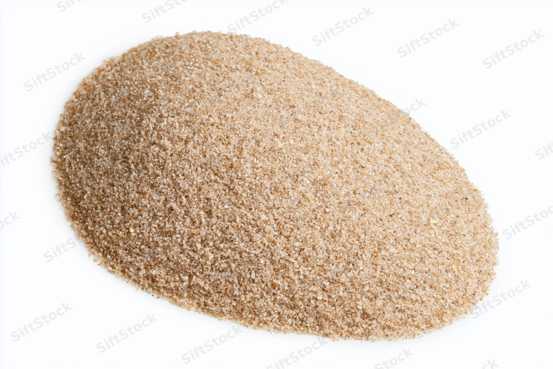 A mound of dry beach sand isolated on a white background