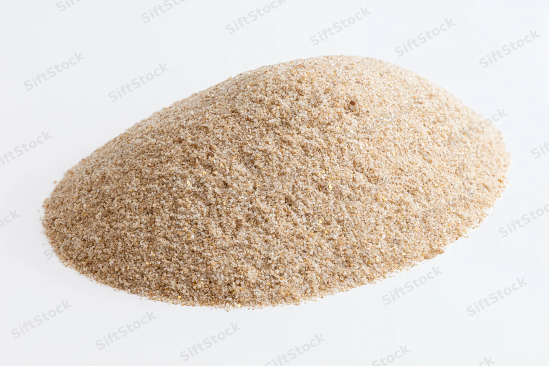 A mound of dry beach sand isolated on a white background