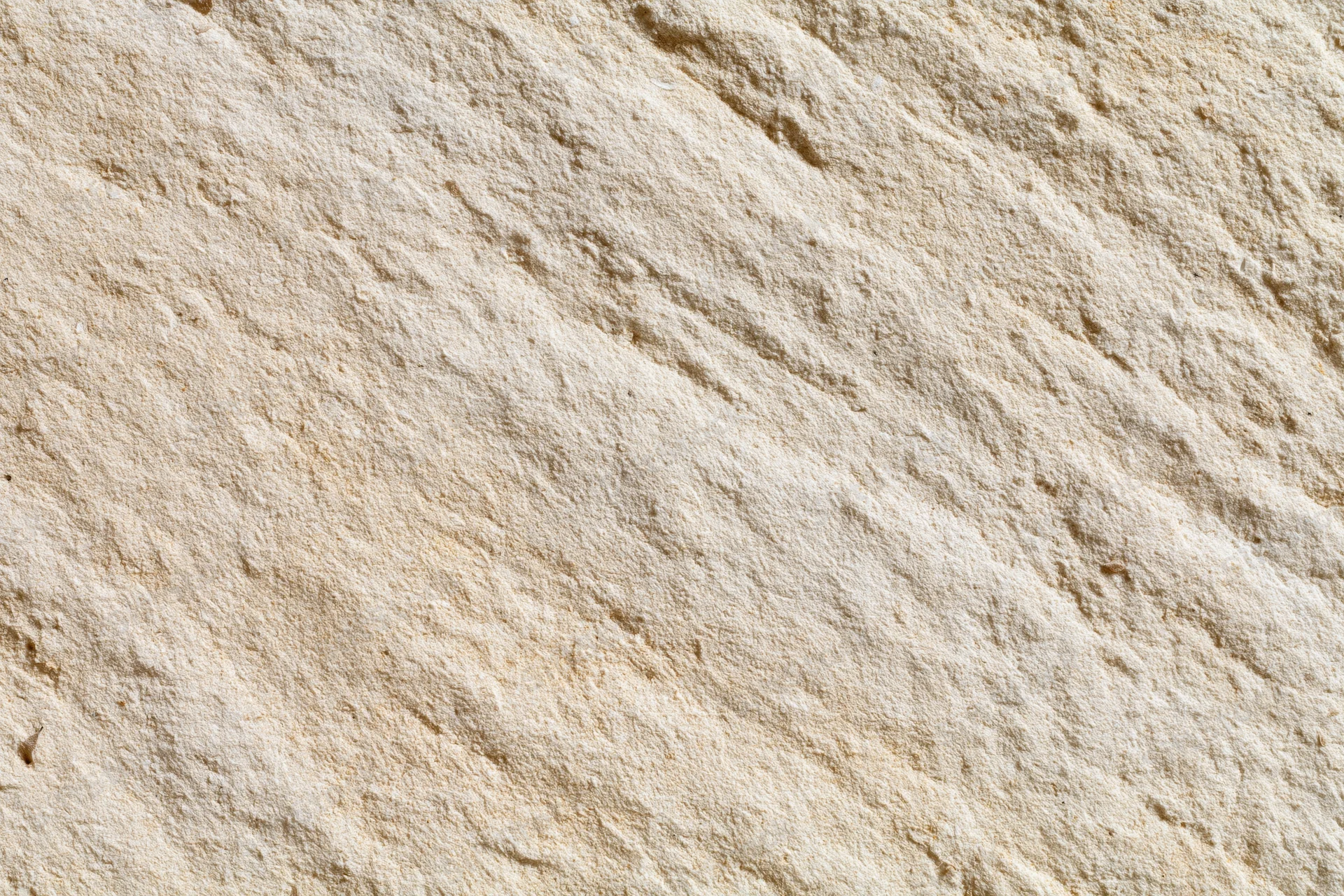 Close-up of rough sandstone surface filling the frame