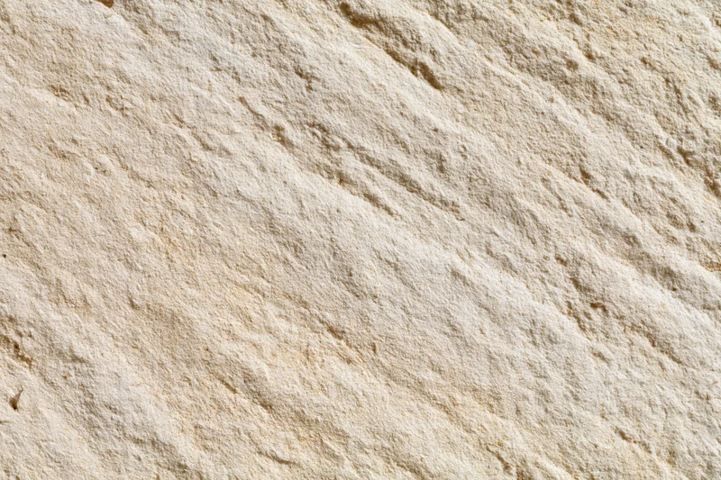 Close-up of rough sandstone surface filling the frame