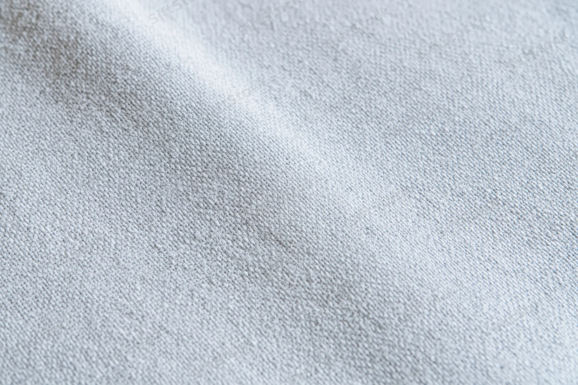 Close-up of plain woven fabric texture filling the frame