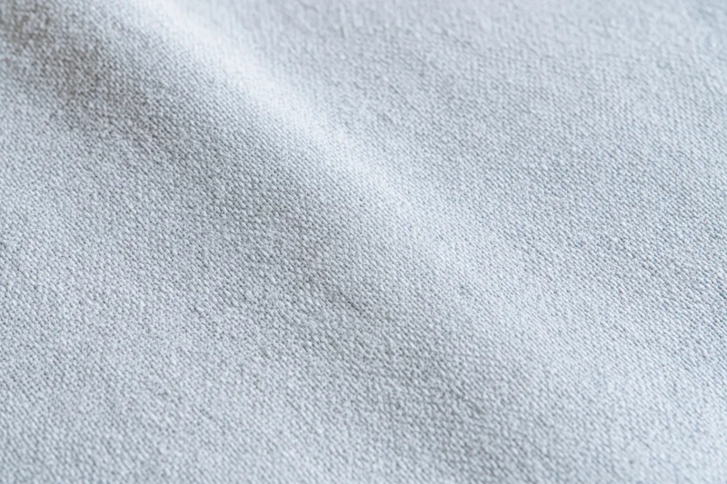 Close-up of plain woven fabric texture filling the frame