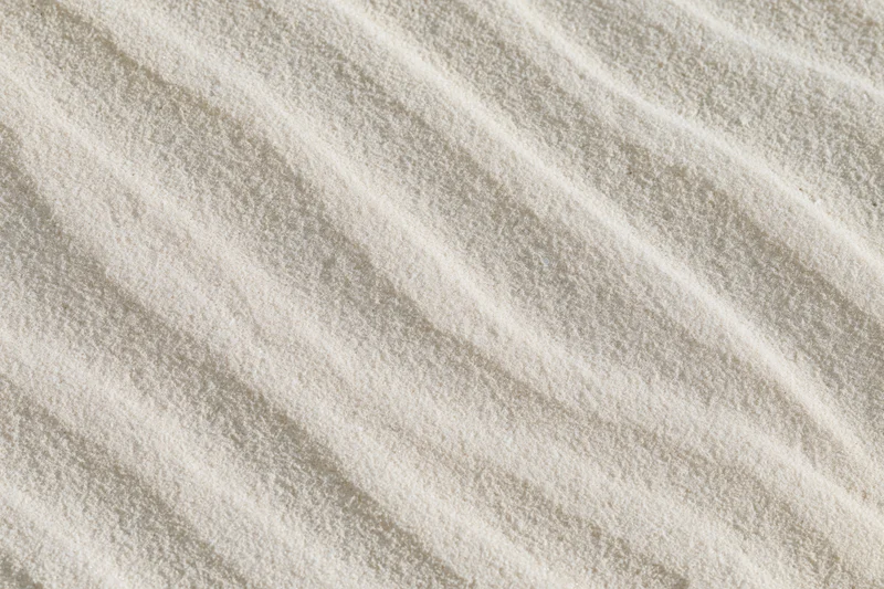 Wind-rippled sand surface in a desert landscape viewed from above
