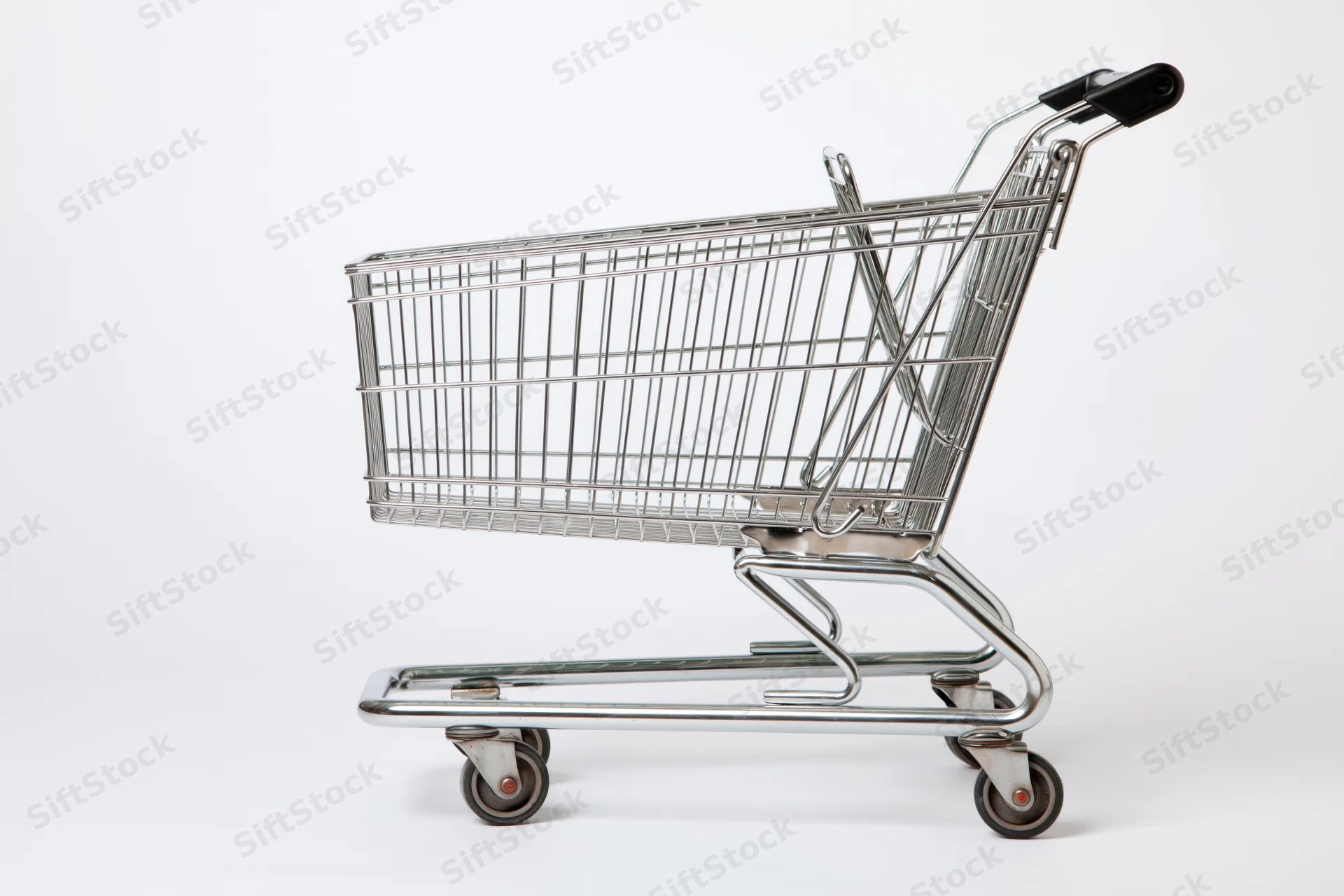 Empty chrome shopping cart side profile on white background