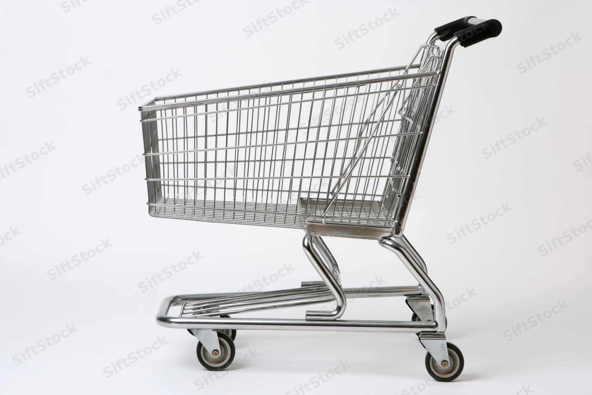Empty chrome shopping cart side profile on white background
