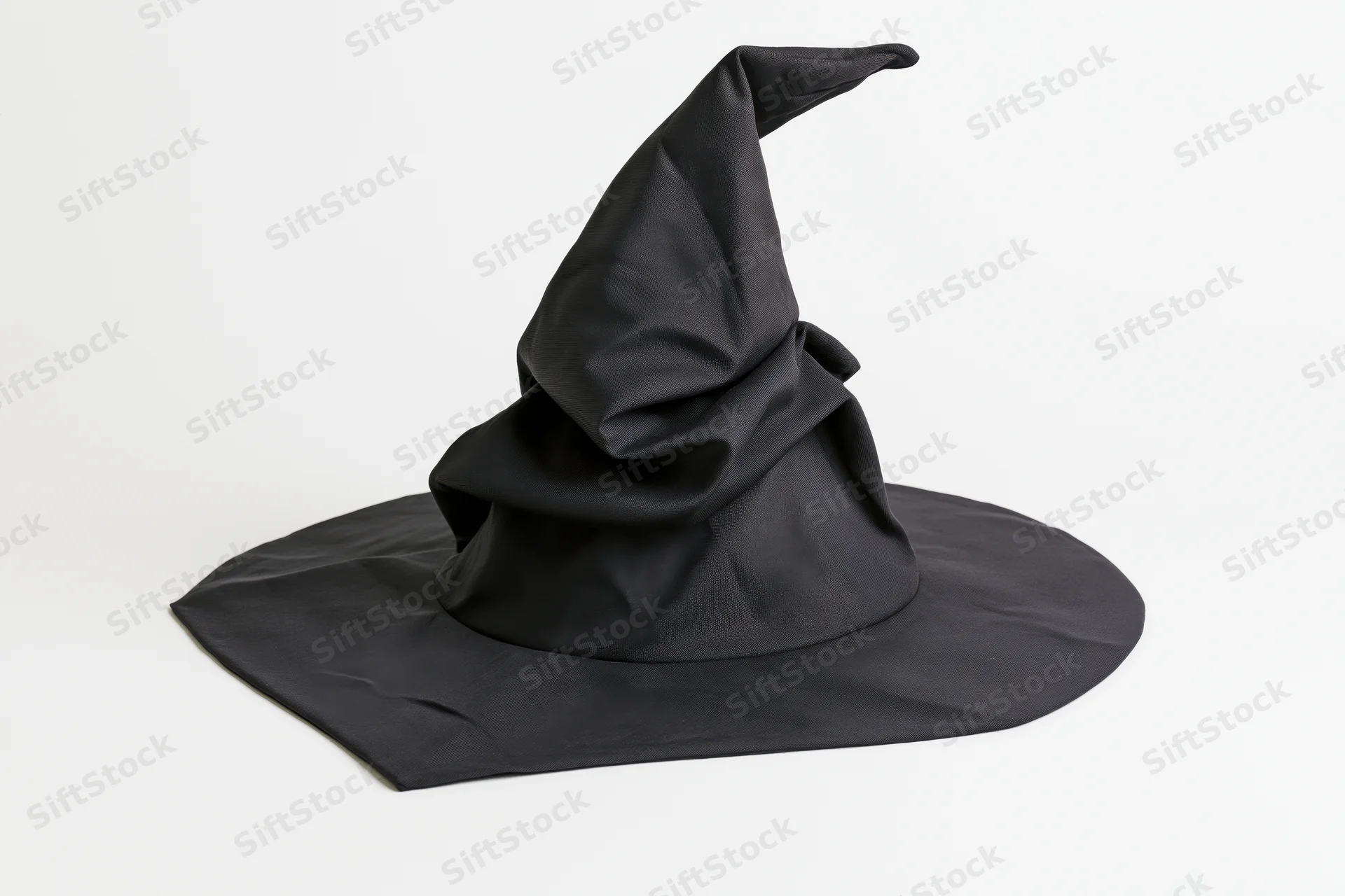 Black fabric witch hat with floppy crumpled pointed crown on white background