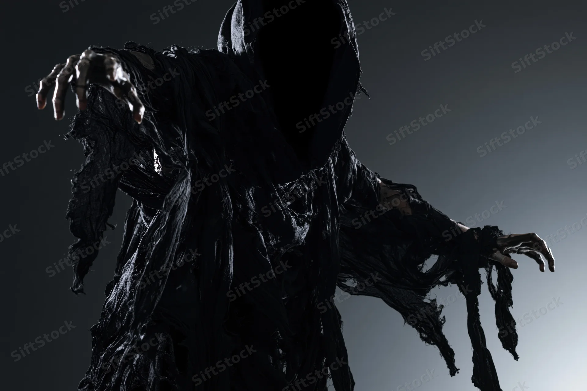 Hooded figure in tattered black robe with outstretched arms against dark background