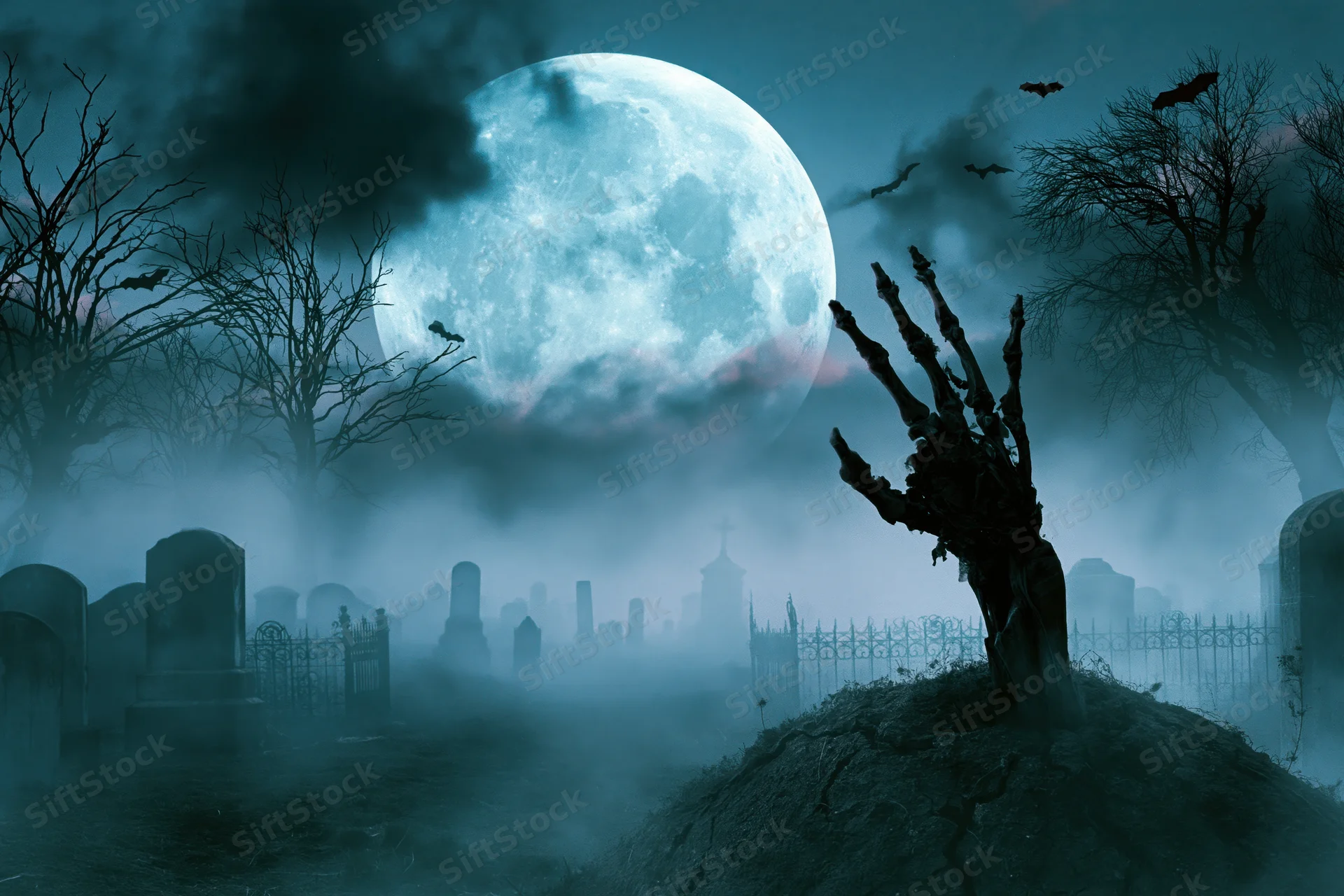 Skeletal hand emerging from a grave in a foggy cemetery under a full moon