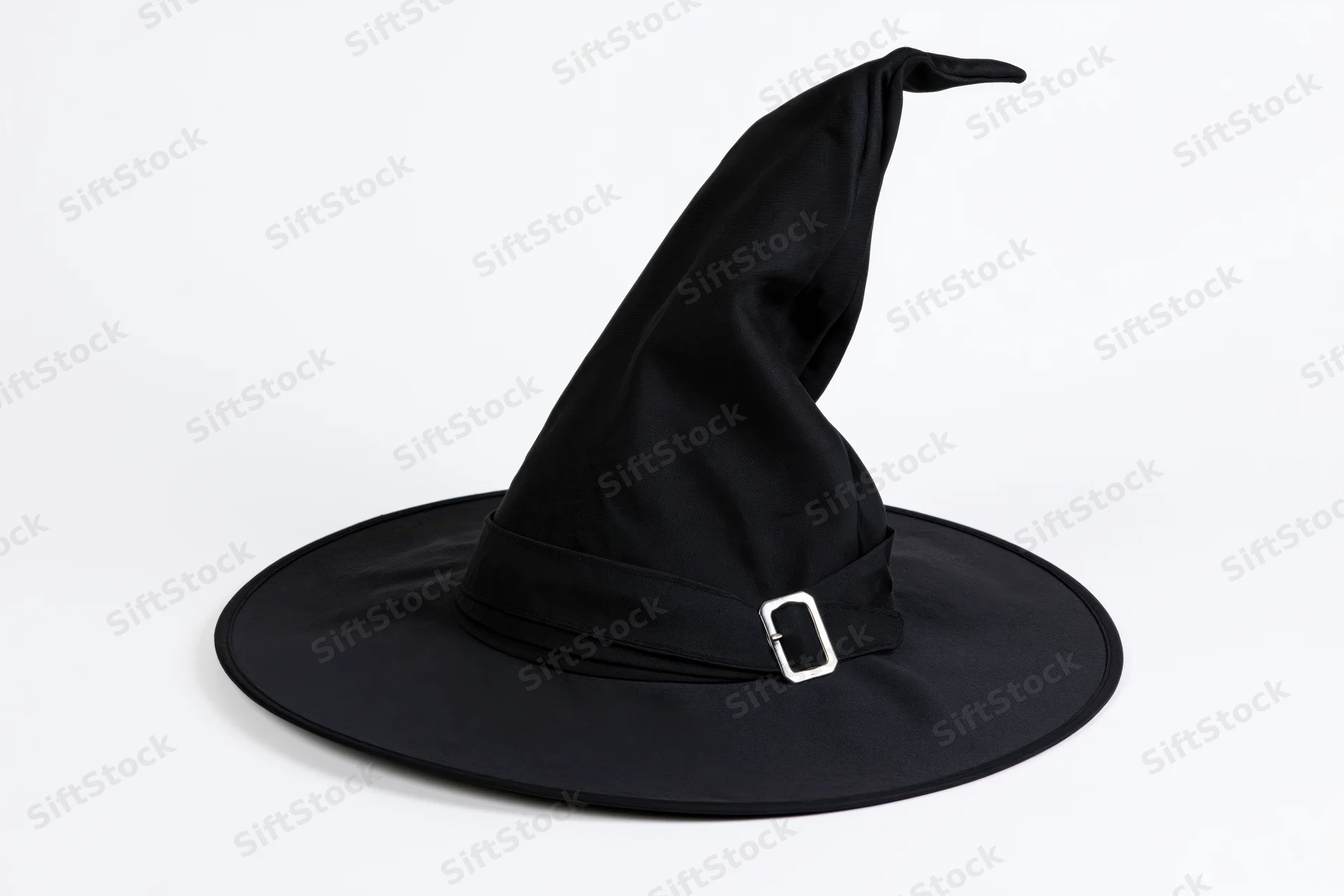 Black witch hat with tall pointed crown and wide brim on white background