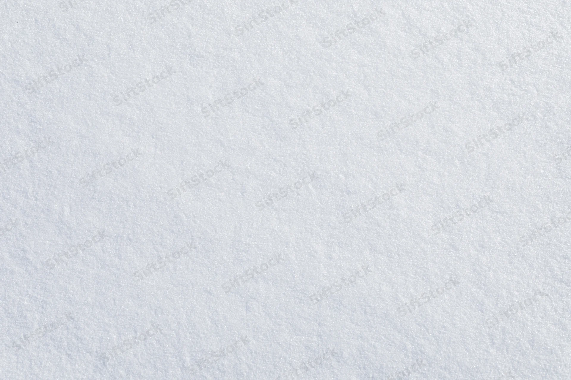 Close-up of smooth fresh snow surface filling the frame