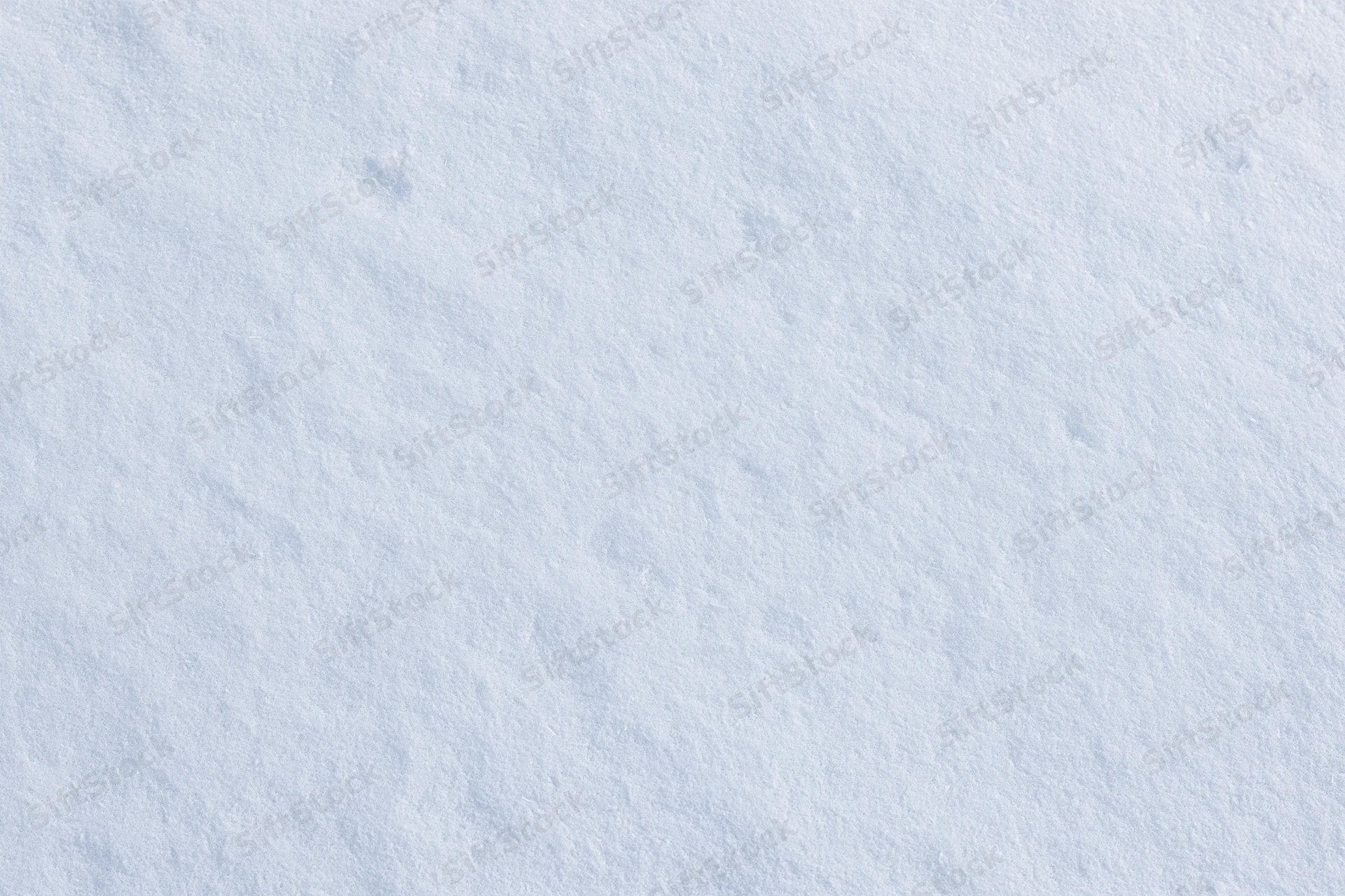 Close-up of undisturbed fresh snow surface filling the frame