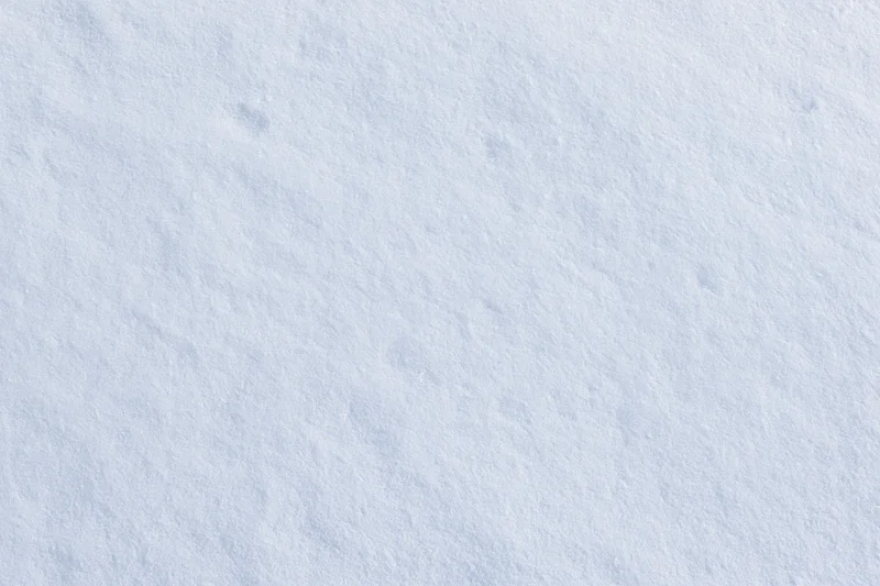 Close-up of undisturbed fresh snow surface filling the frame