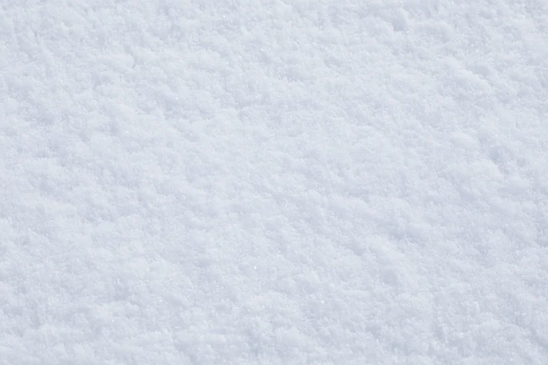 Closeup of freshly packed snow covering the ground in winter