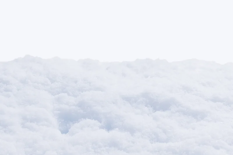 Closeup of fresh white snow covering a low mound outdoors in winter