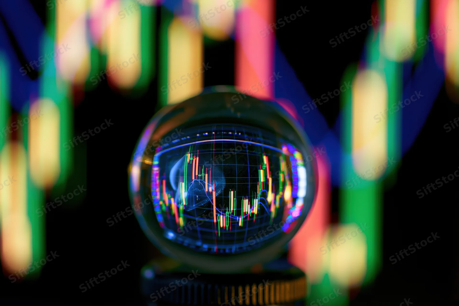 Crystal ball reflecting inverted stock market candlestick chart against colorful bokeh lights