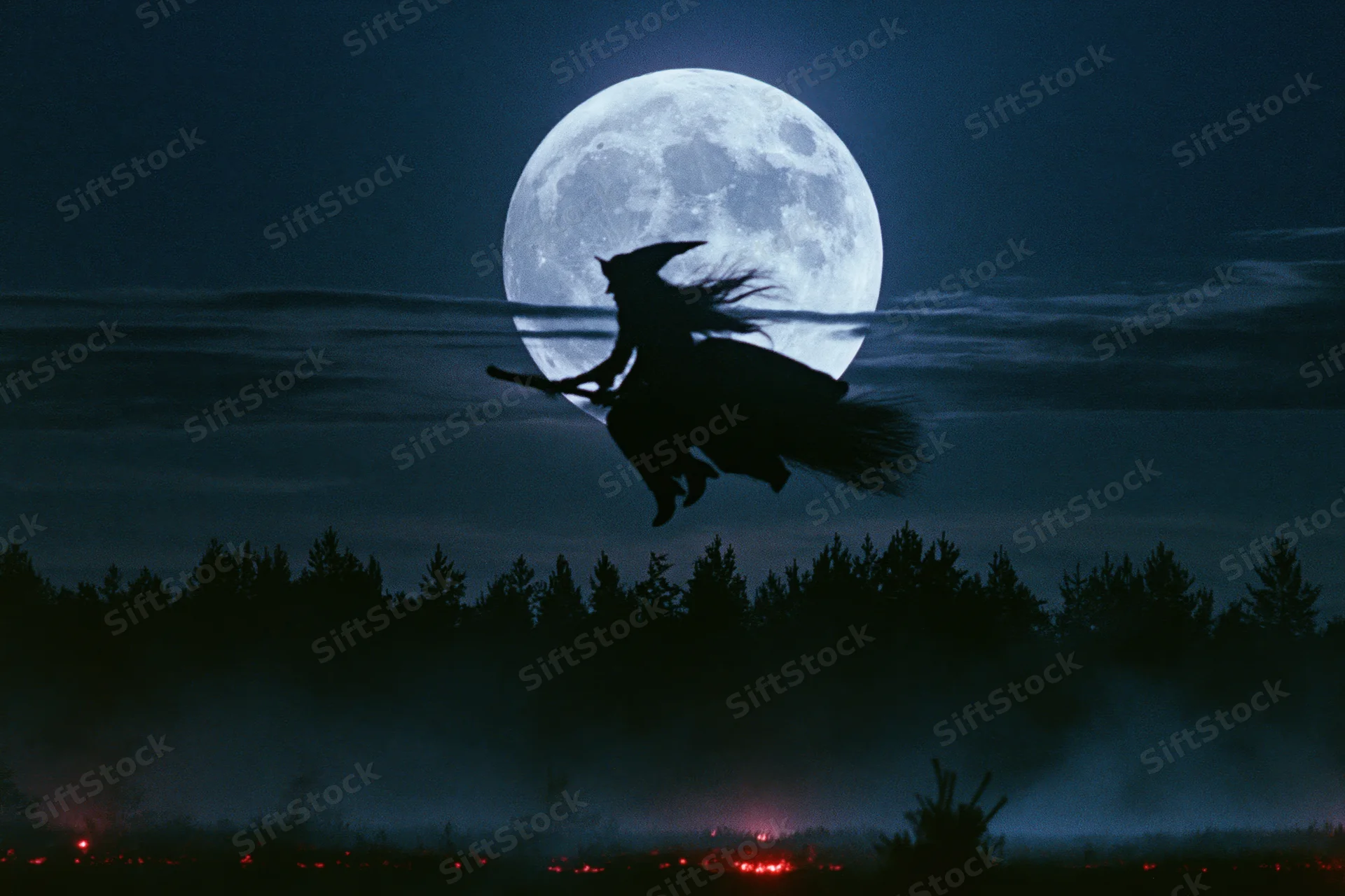 Witch flying on broomstick against full moon over forest at night