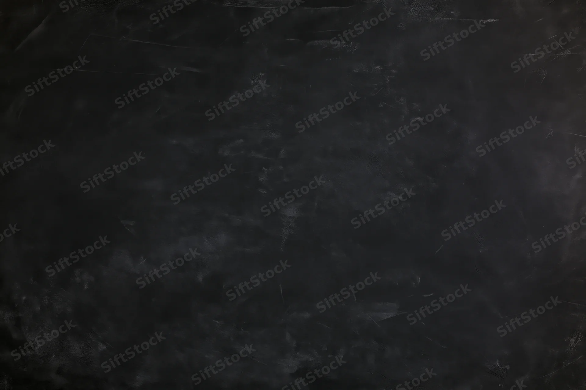 Dark weathered concrete wall surface with rough texture and scuffs