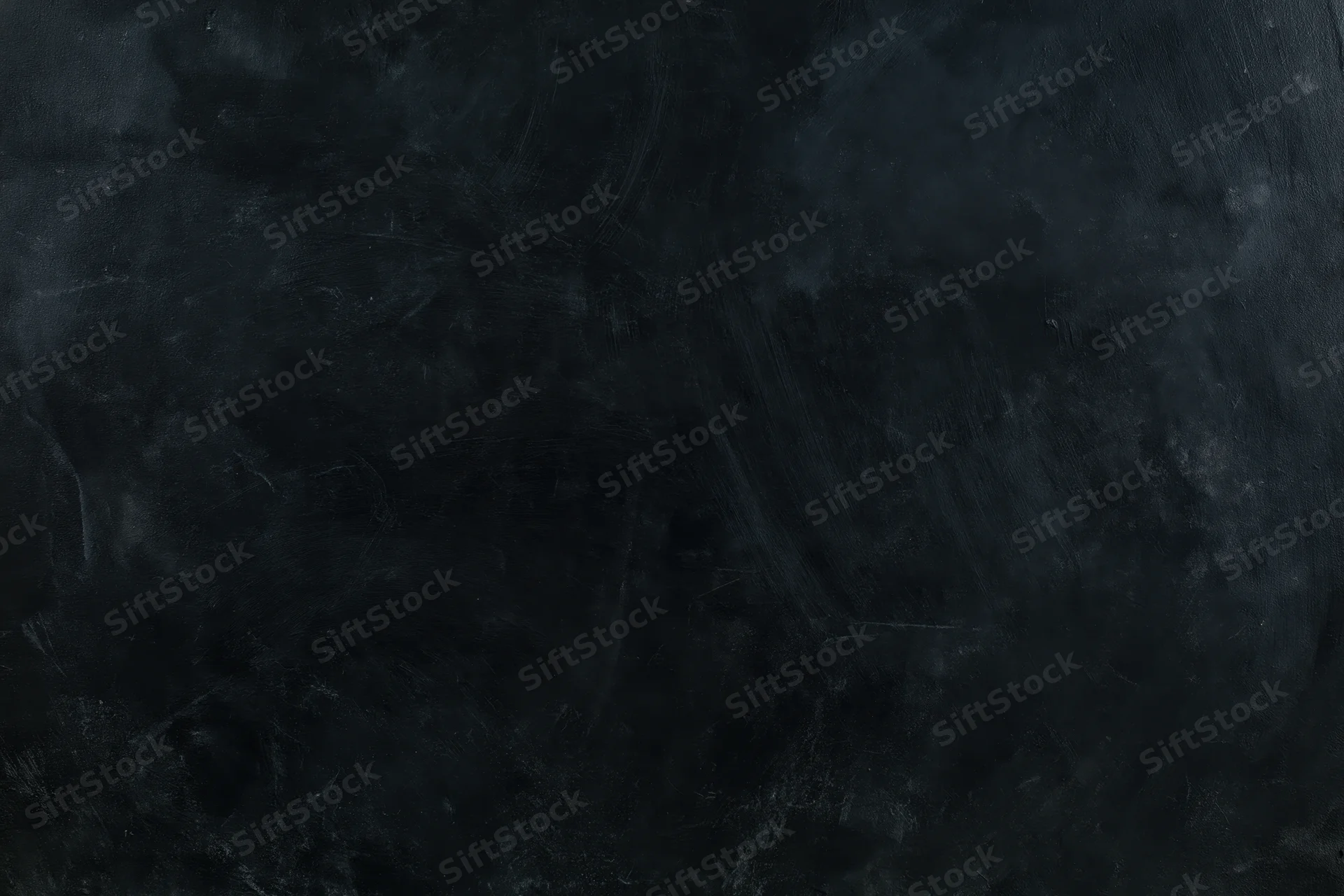 Dark weathered concrete wall surface with textured grunge pattern