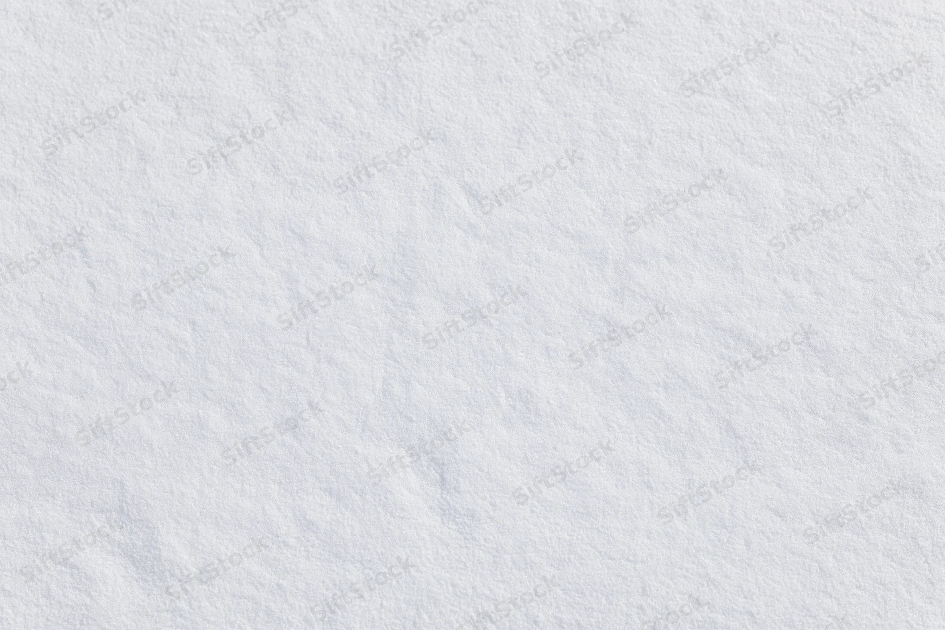 Flat undisturbed snow surface filling the frame