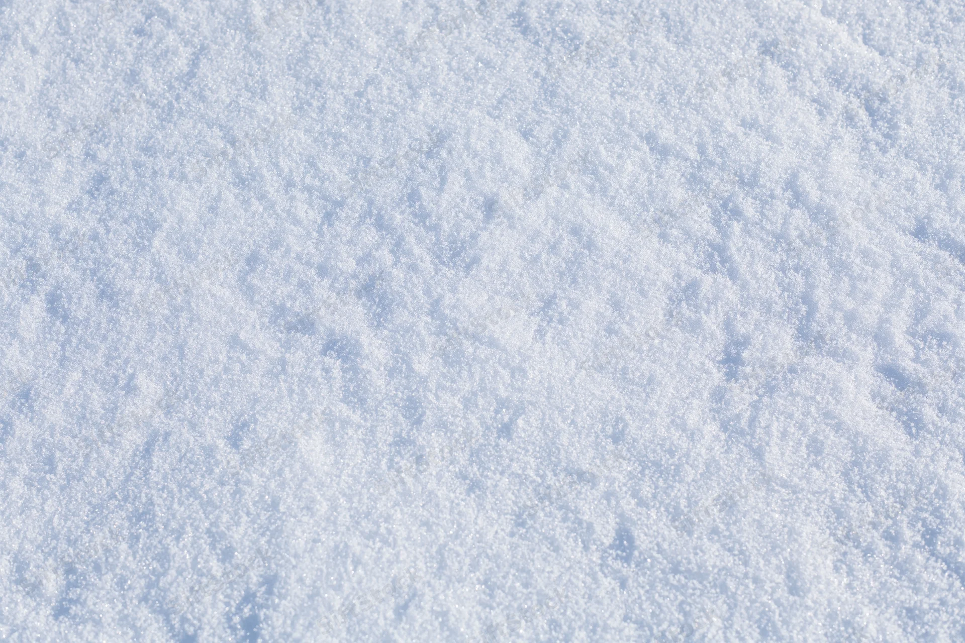 Close-up of undisturbed snow surface filling the frame