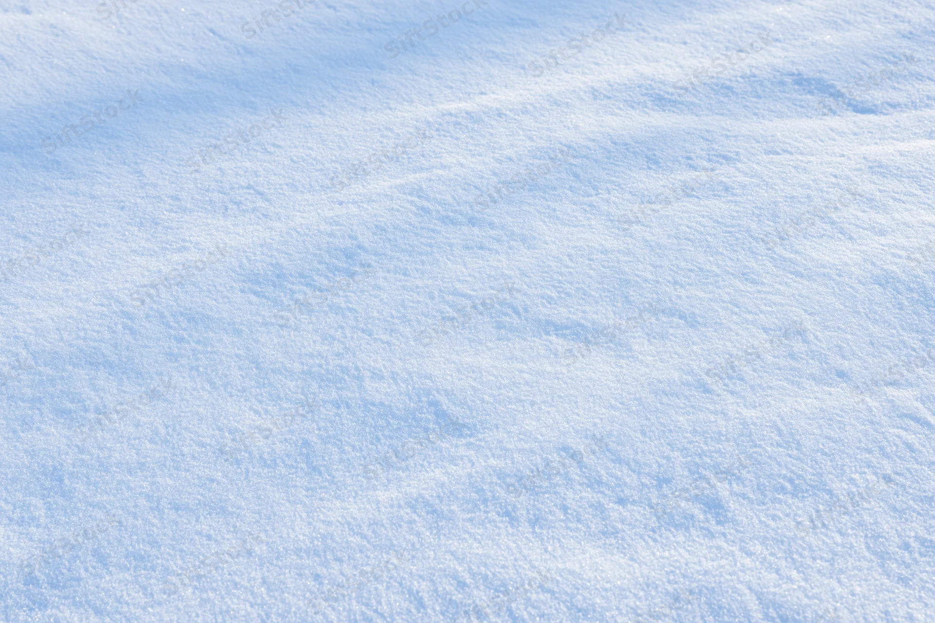 Undisturbed snow surface covering the ground in a winter landscape