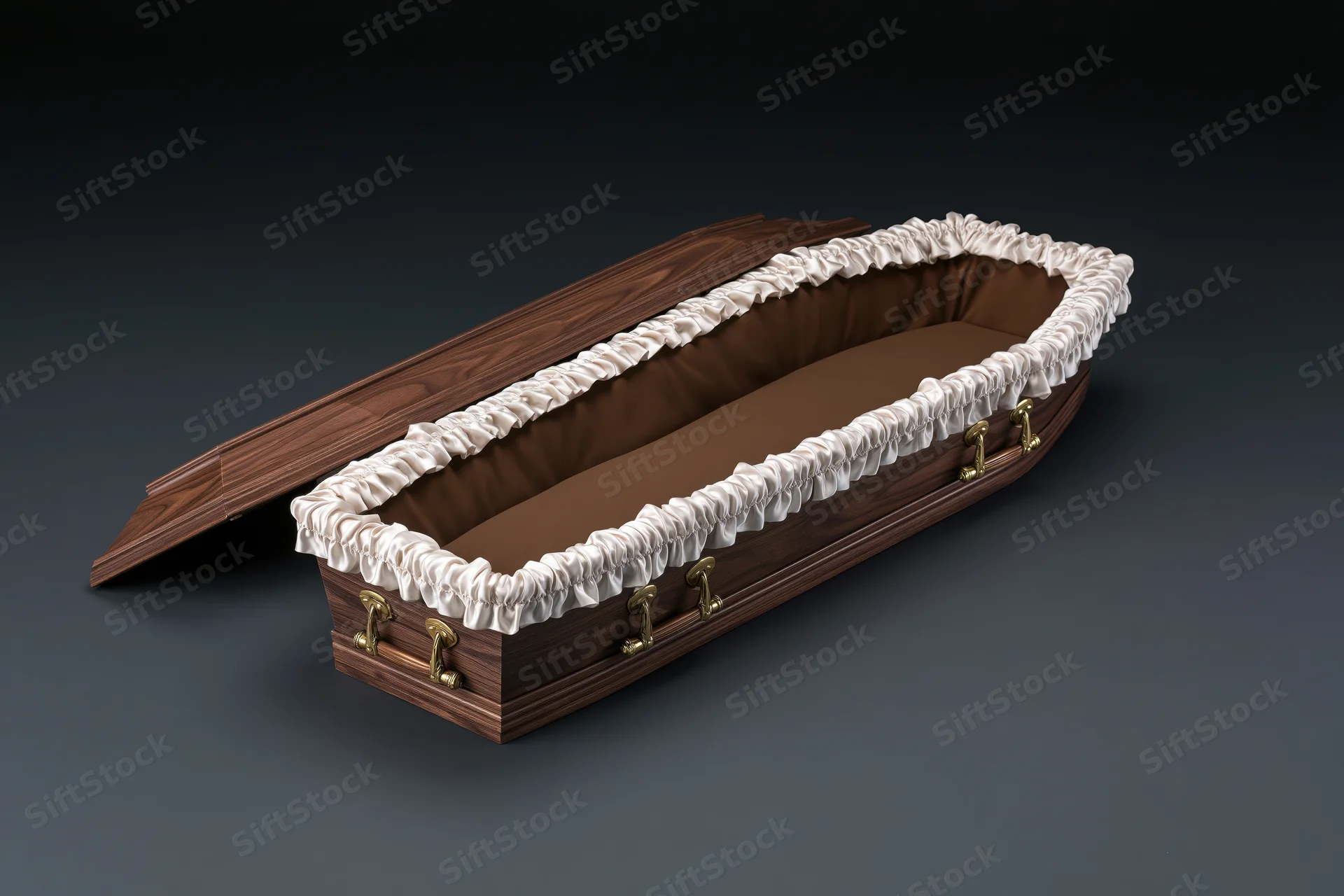 Open wooden coffin with white ruffled lining and brass handles viewed from above on dark background