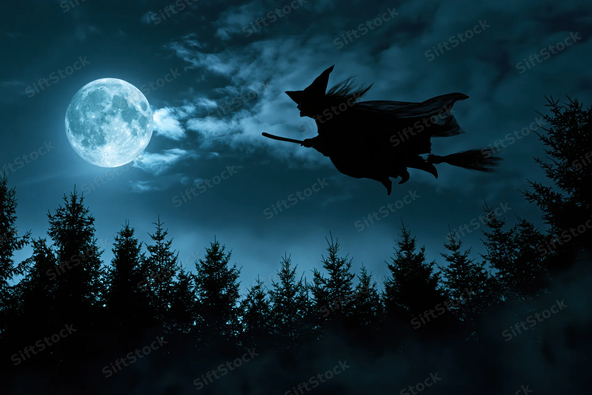 Witch flying on broomstick across full moon over forest at night