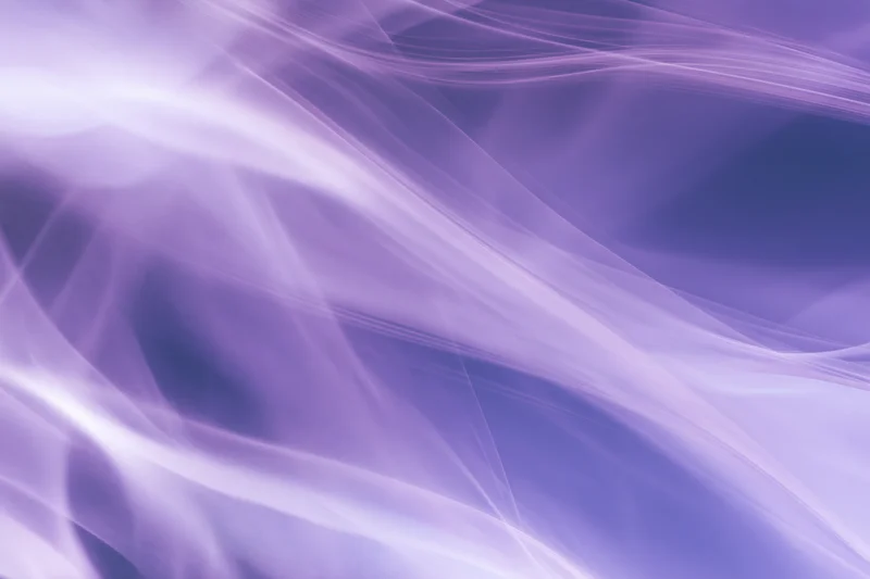 Flowing translucent purple smoke drifting across a soft gradient background